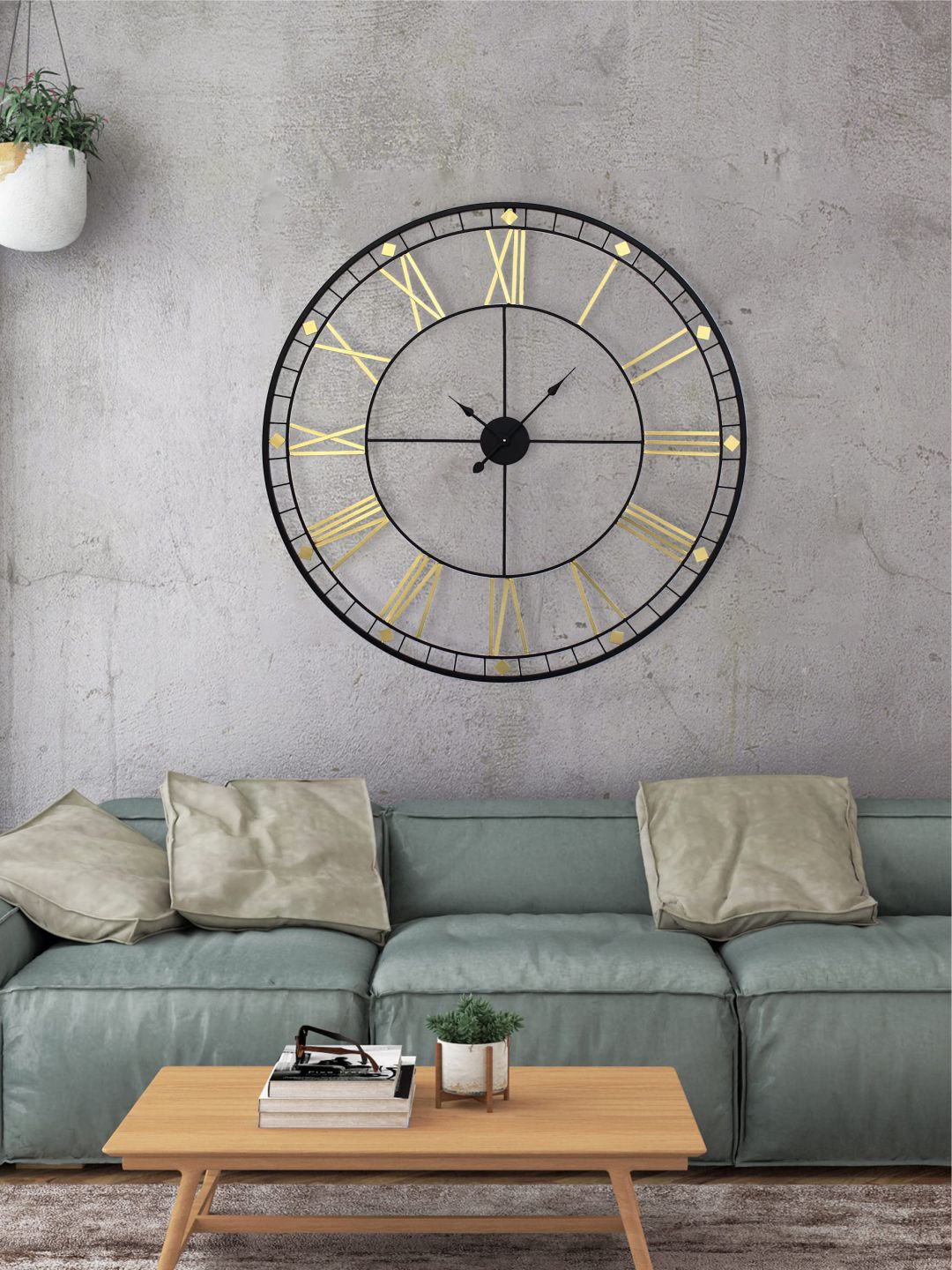 

The Art House Black & Gold Toned Textured Round Shaped Contemporary Wall Clock
