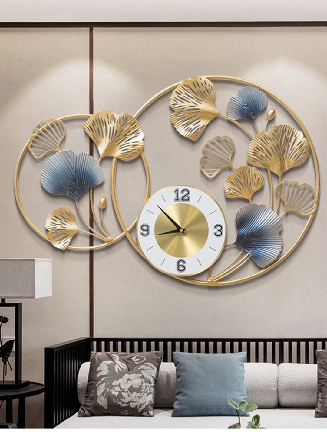

The Art House Gold-Toned & Blue Round Shaped Metal Wall Clock