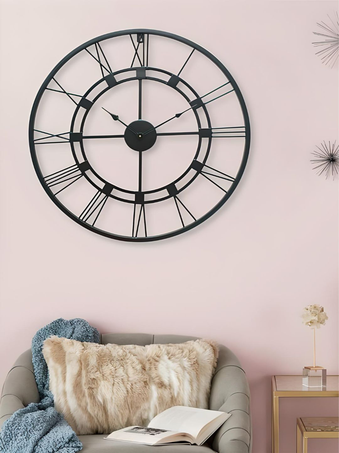 

The Art House Black Round Shaped Metal Wall Clock
