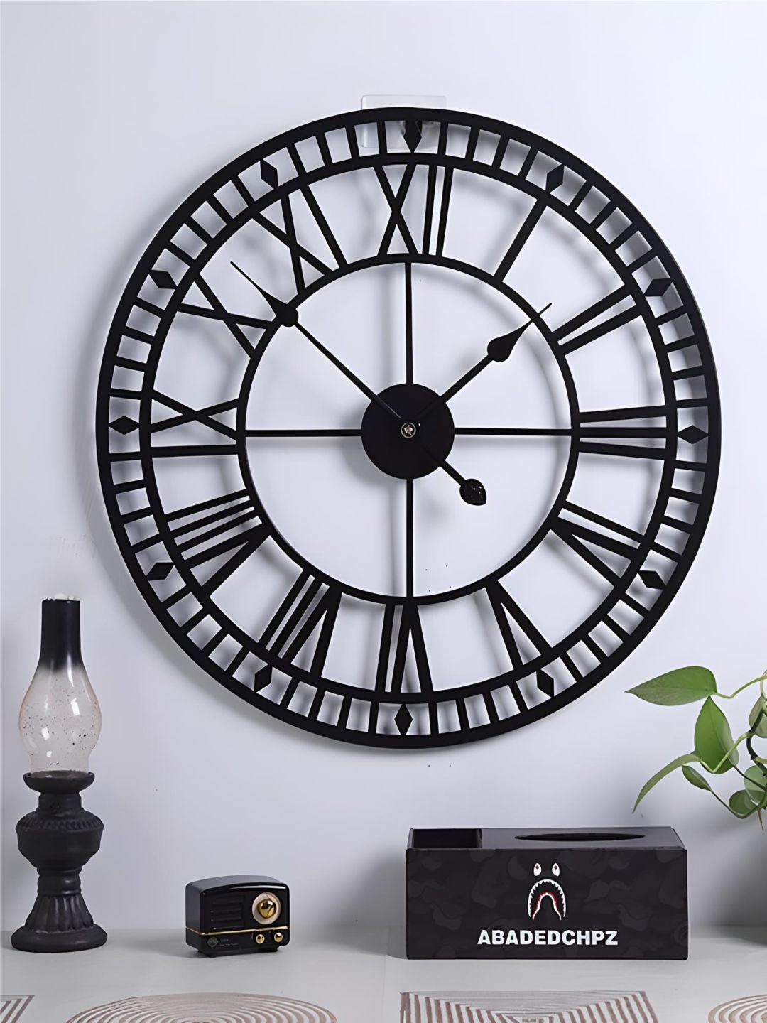 

The Art House Black Round Shaped Wall Clock