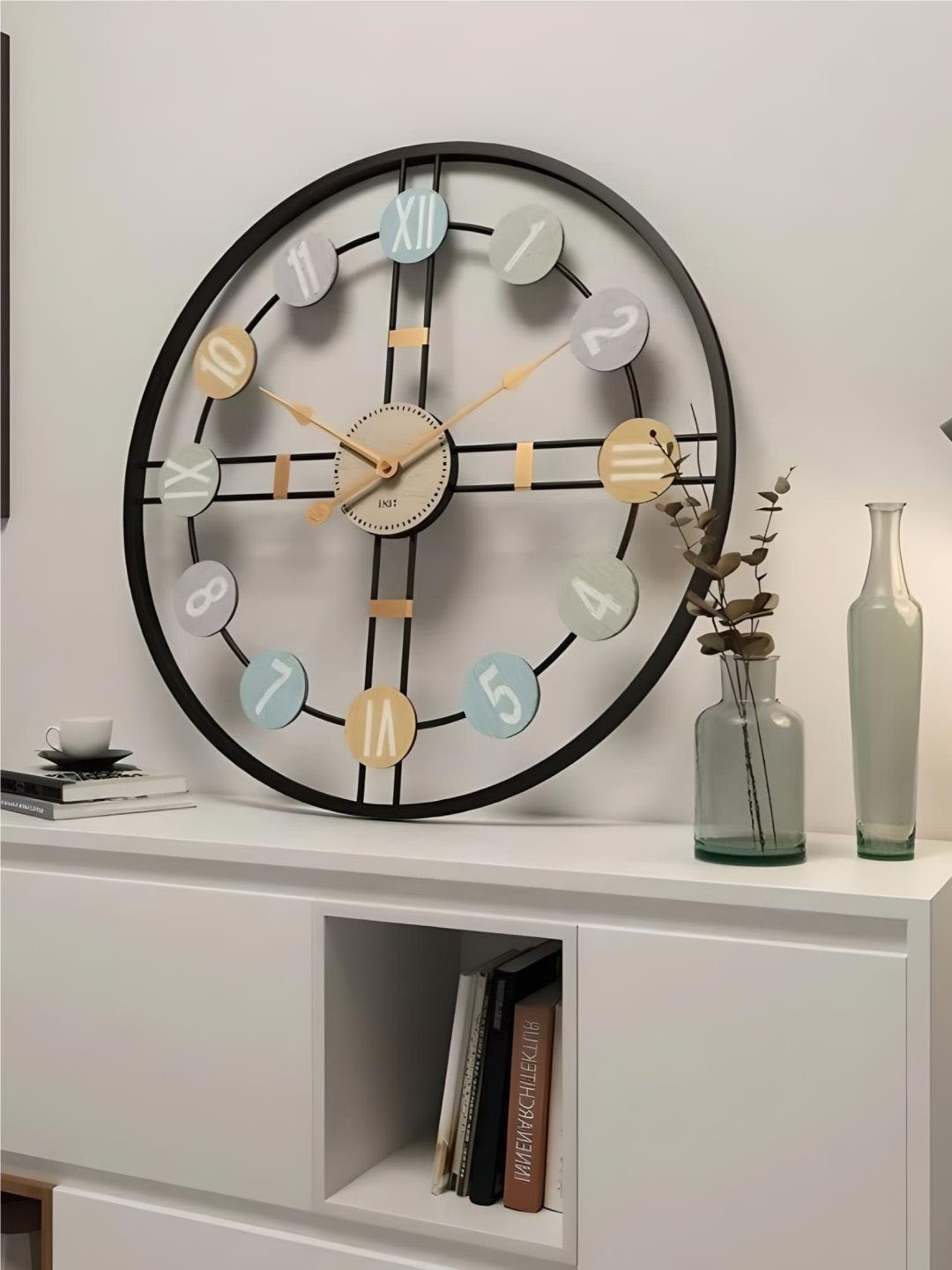 

The Art House Black & Blue Round Shaped Wall Clock