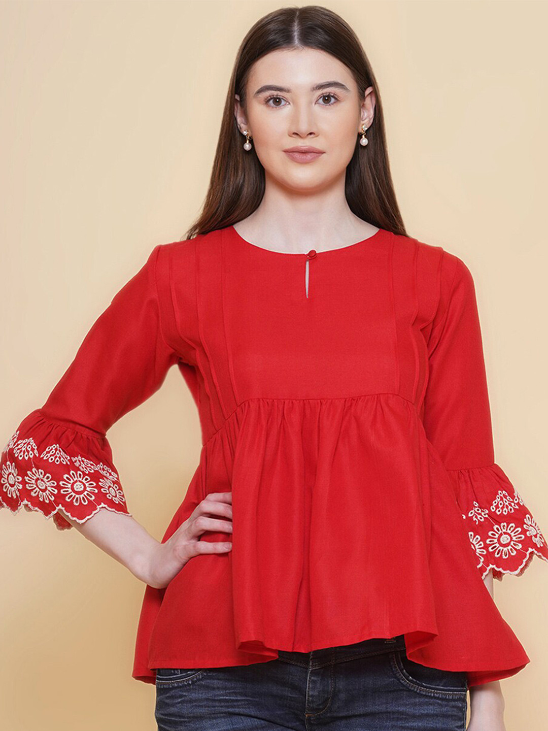 

Modish Couture Keyhole Neck Self Design Opaque Peplum Top, Yellow