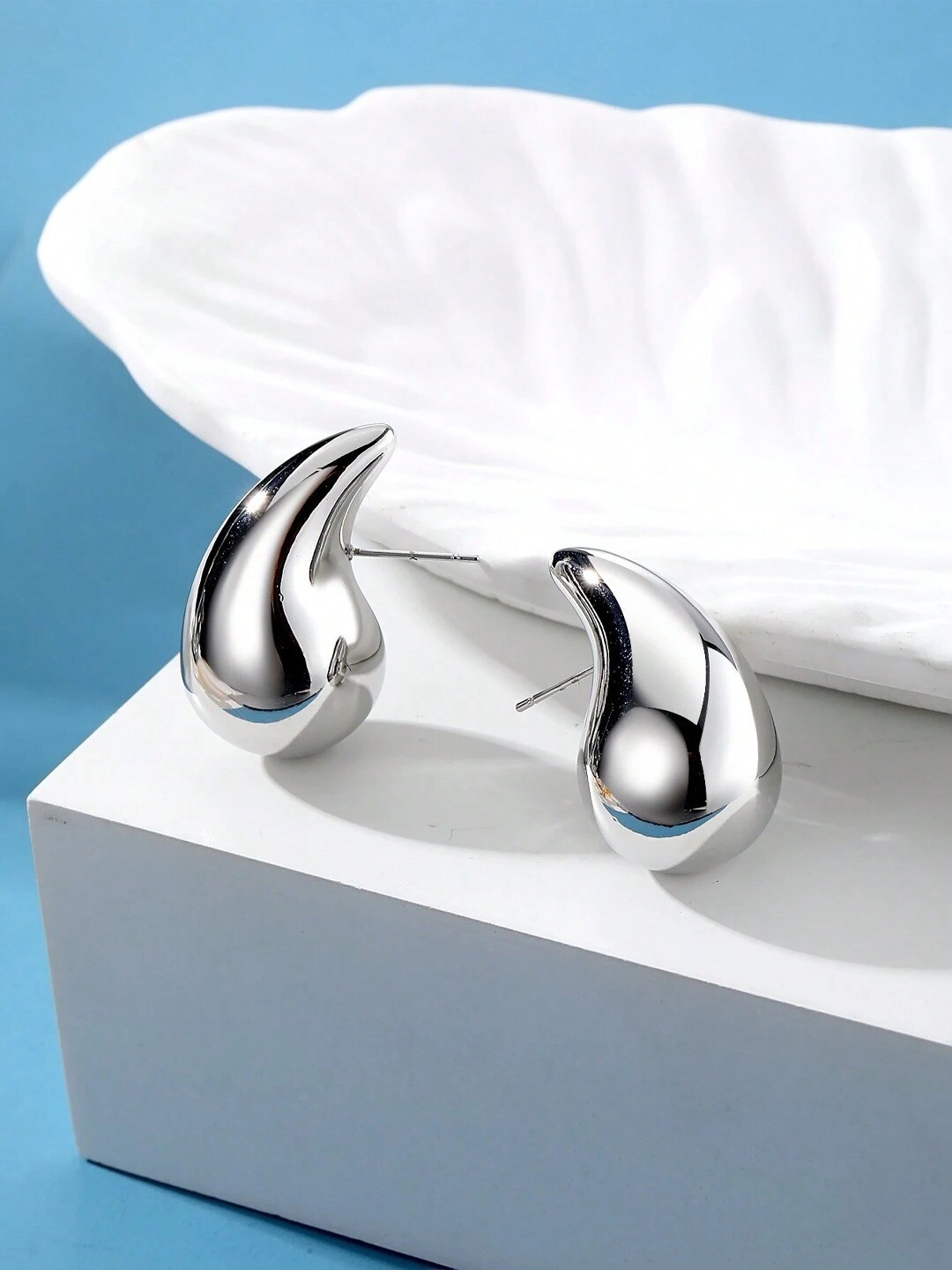 

VAGHBHATT Stainless Steel Silver-Plated Teardrop Shaped Chunky Stud Earrings