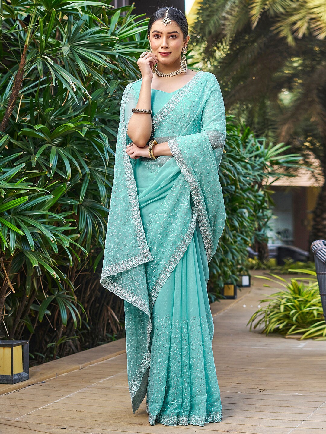 

Mitera Turquoise Blue Ethnic Motifs Zari Embroidered Saree