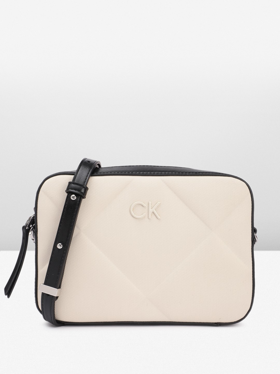 

Calvin Klein Textured Structured Sling Bag with Quilted Detail, Off white