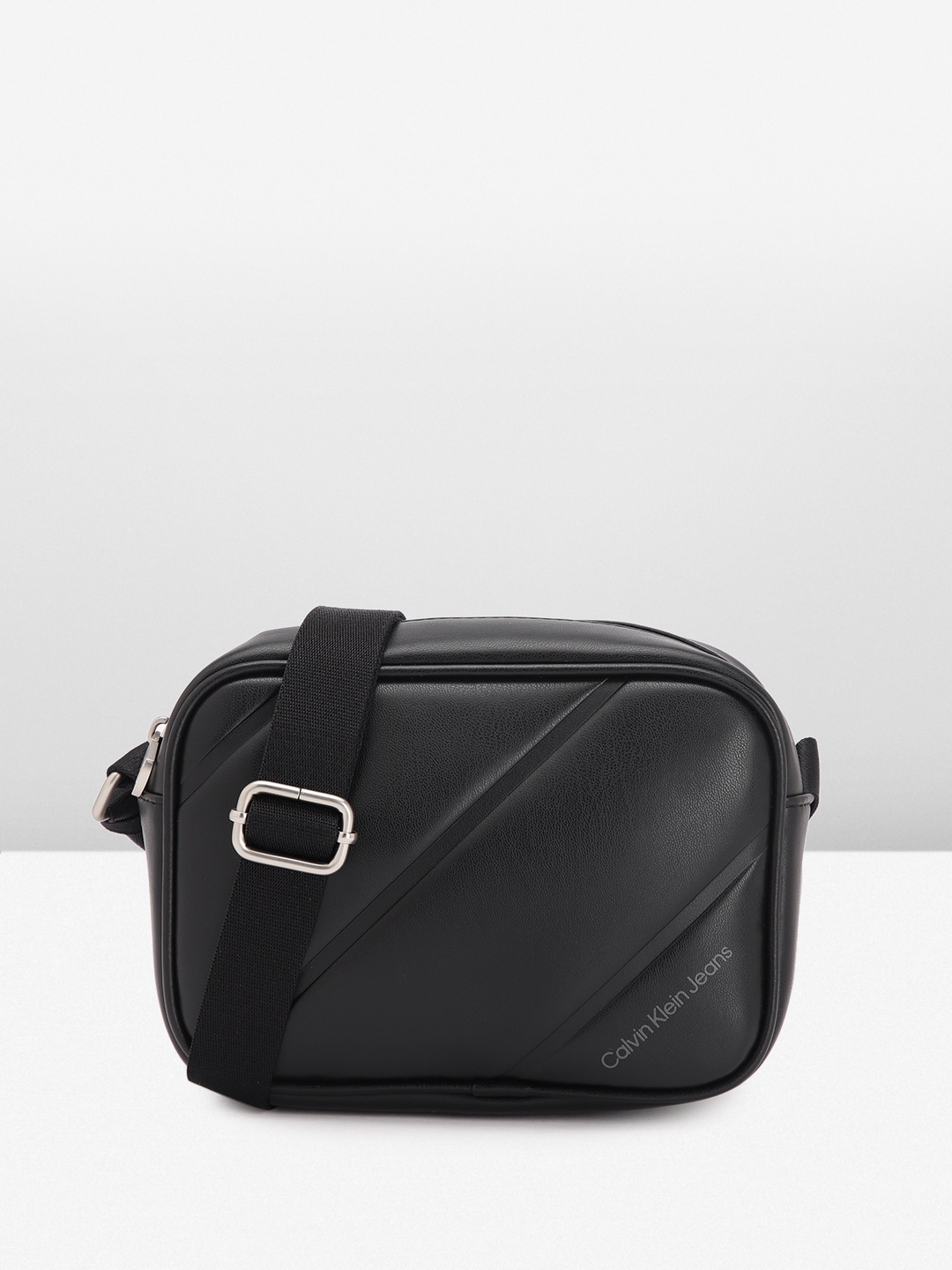 

Calvin Klein Women Solid Sling Bag, Black