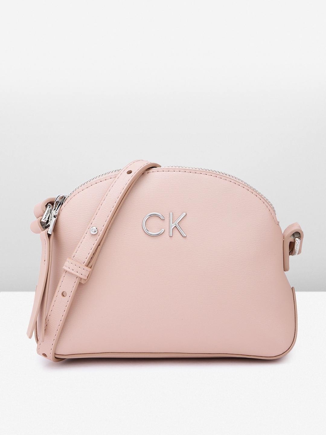 

Calvin Klein Women Solid Sling Bag, Pink
