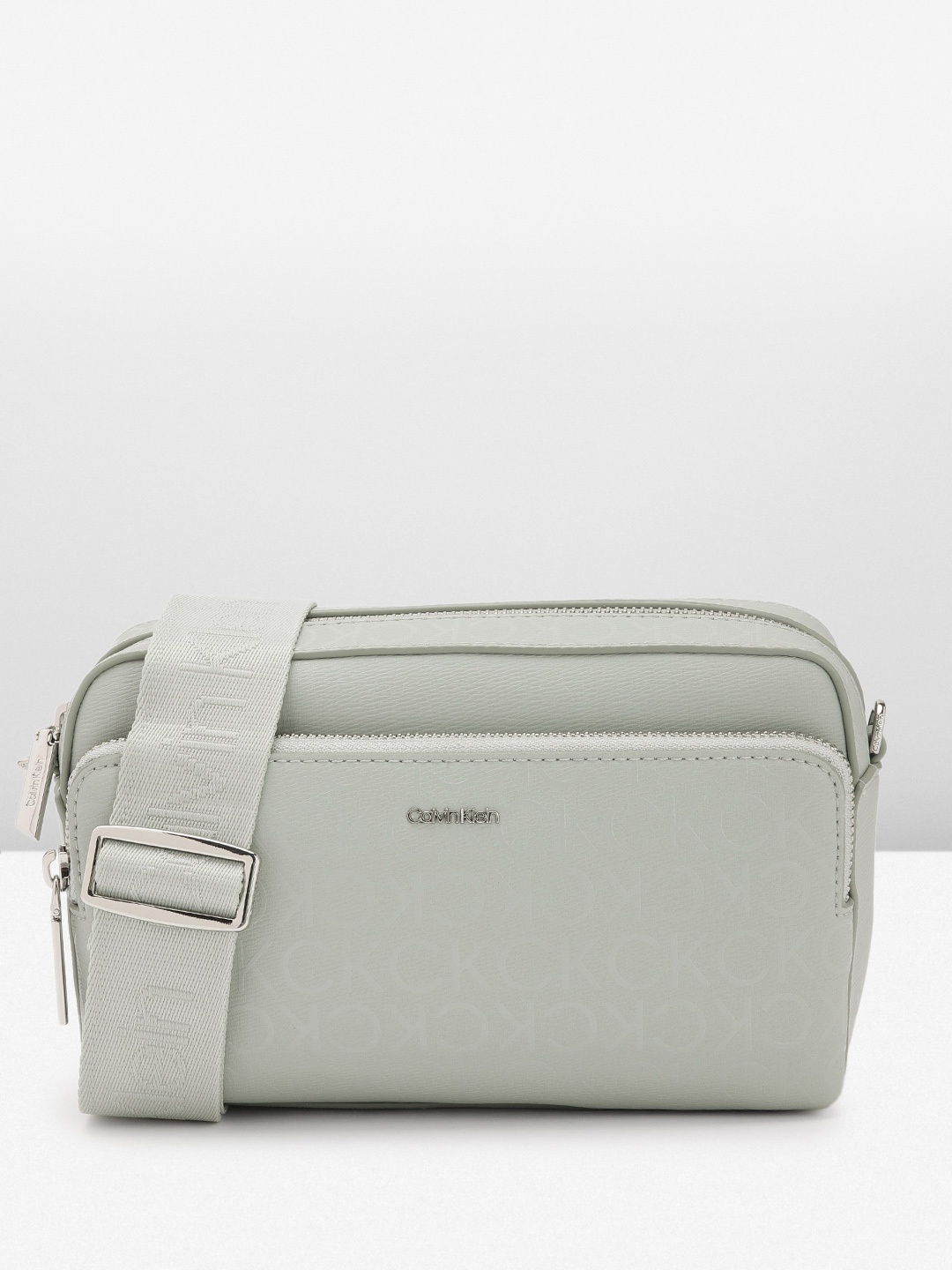 

Calvin Klein Brand Logo Printed Sling Bag, Grey
