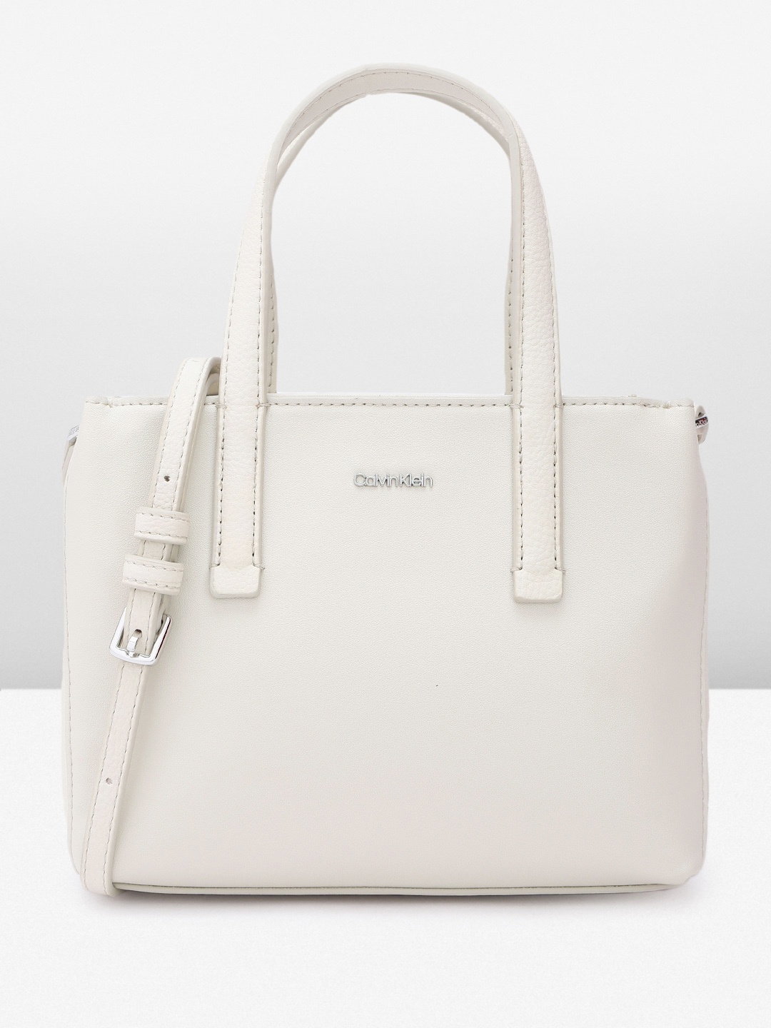 

Calvin Klein Women Solid Handheld Bag, Off white