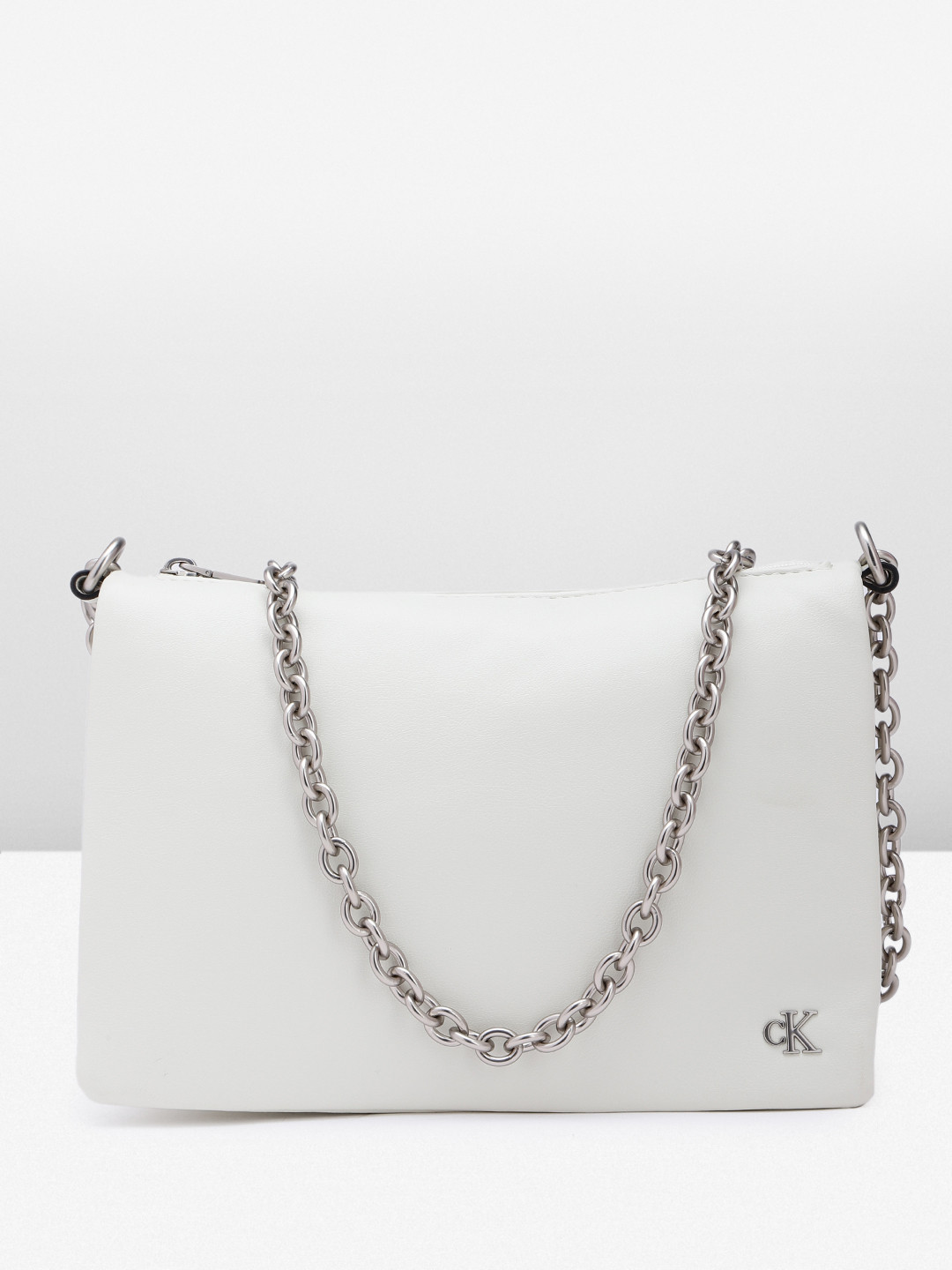 

Calvin Klein Women Solid Sling Bag, Off white
