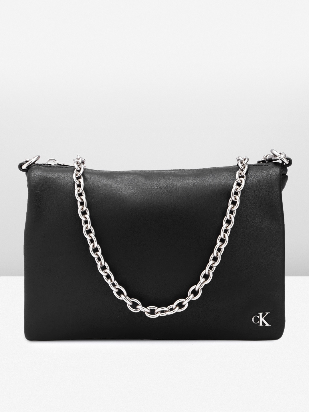 

Calvin Klein Women Solid Sling Bag, Black