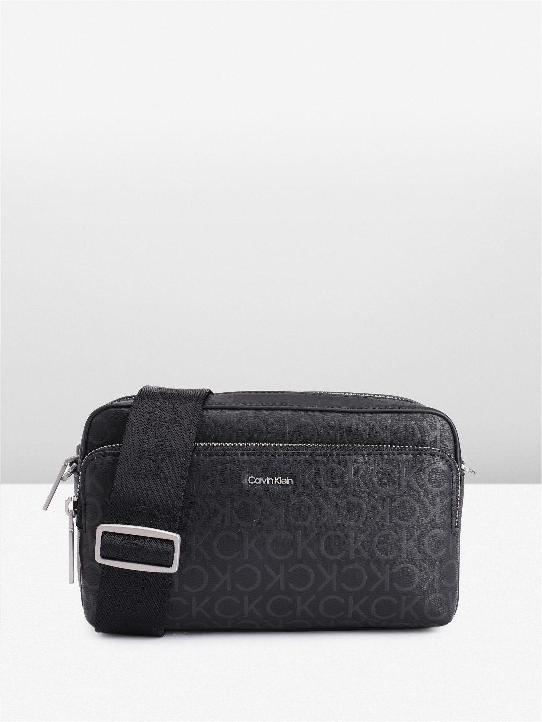 

Calvin Klein Brand Logo Printed Sling Bag, Black