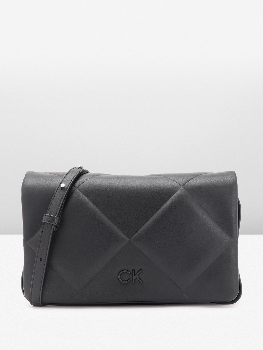 

Calvin Klein Women Quilted Sling Bag, Black