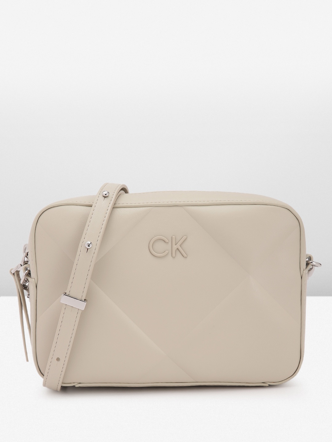 

Calvin Klein Women Quilted Sling Bag, Grey