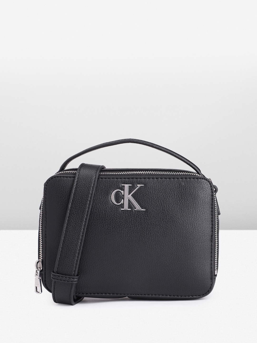 

Calvin Klein Women Solid Sling Bag, Black