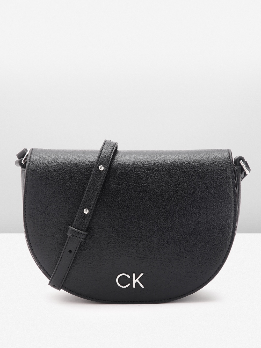 

Calvin Klein Women Solid Sling Bag, Black