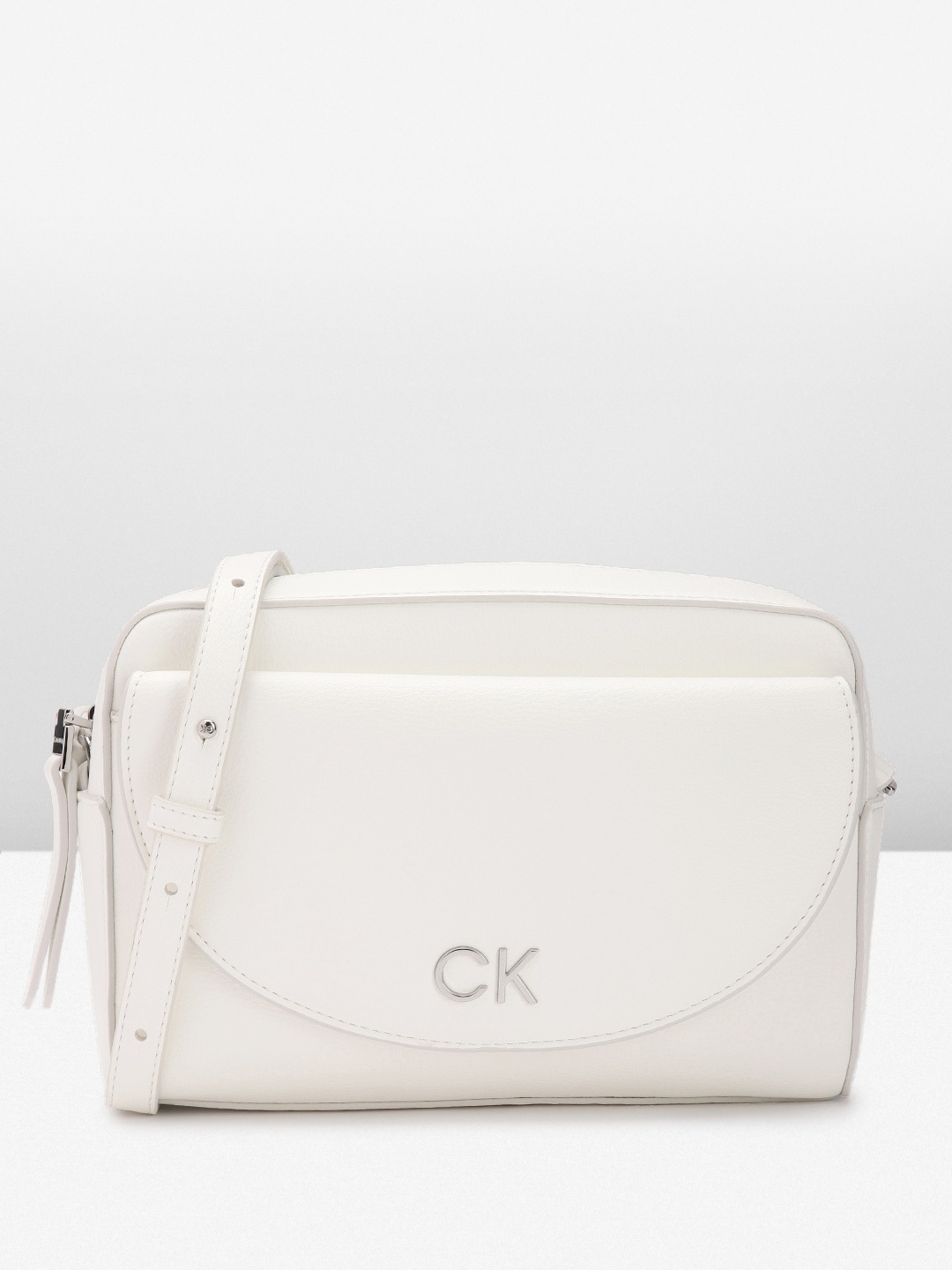 

Calvin Klein Women Solid Sling Bag, White
