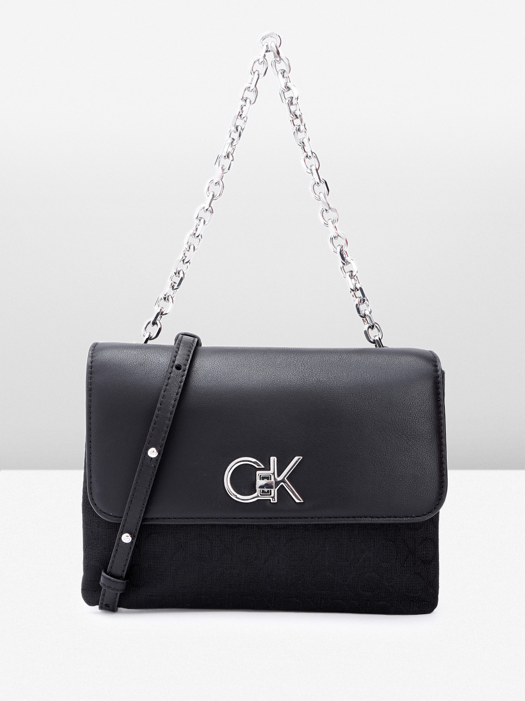 

Calvin Klein Women Solid Sling Bag, Black
