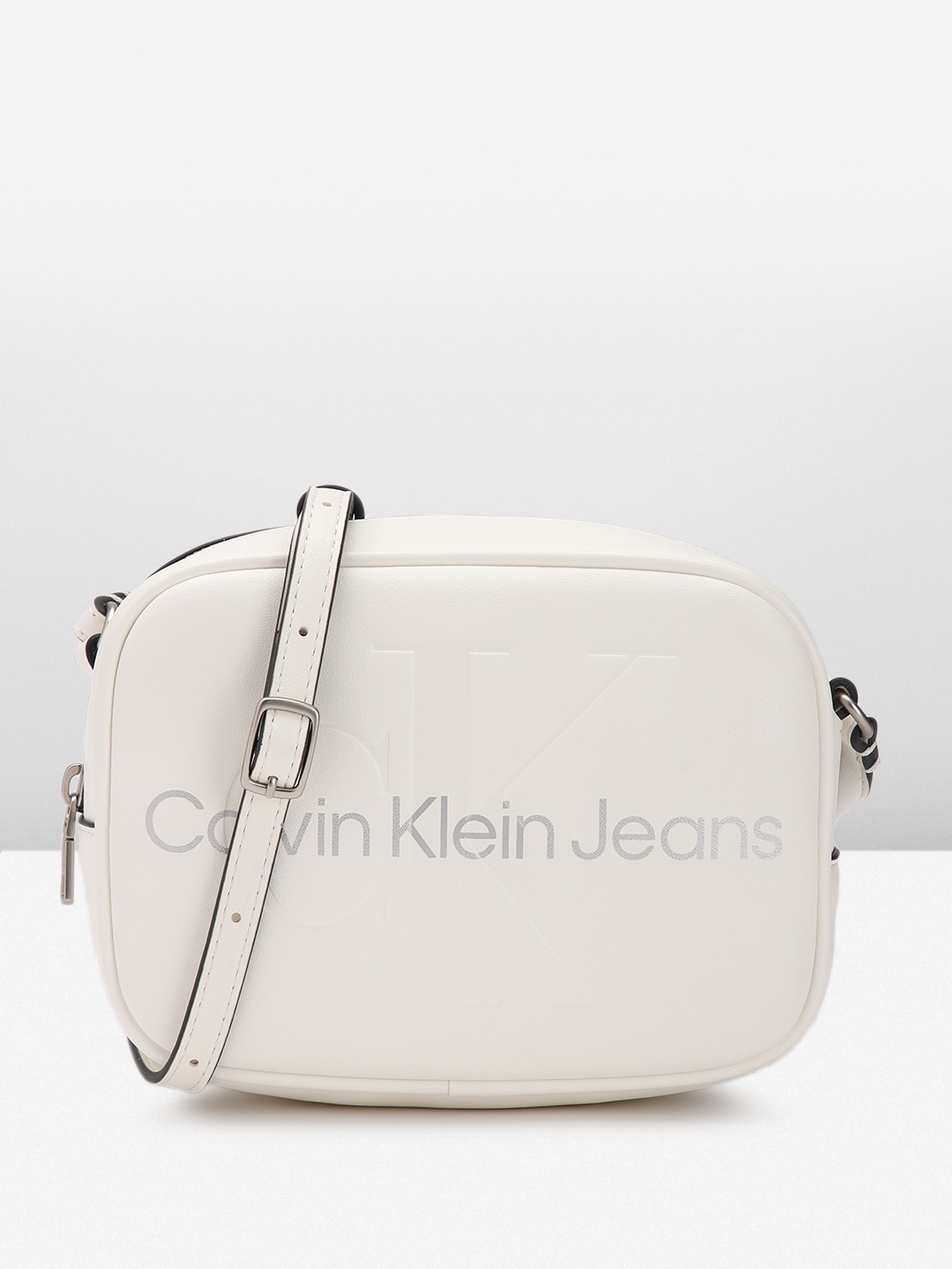 

Calvin Klein Brand Logo Printed Sling Bag, White