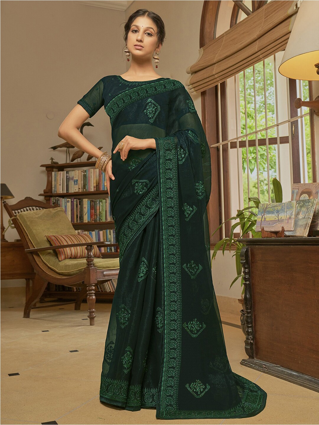 

Mitera Green Ethnic Motifs Beads And Stones Embellished Saree