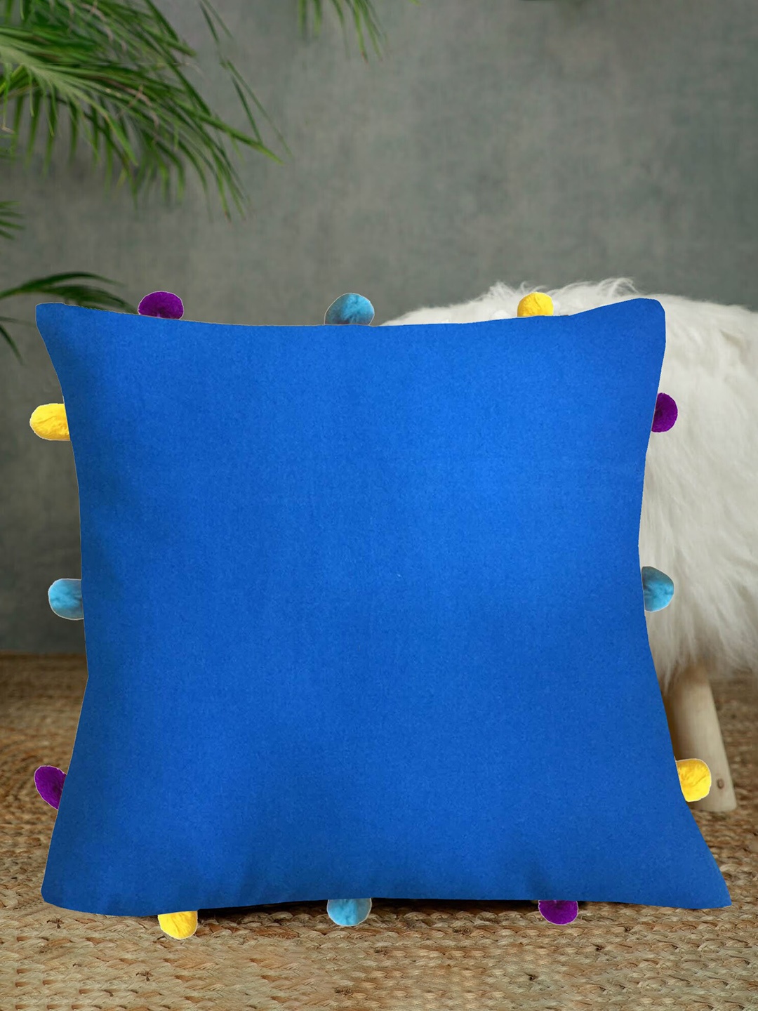 

Lushomes Blue Cotton Square Cushion Cover With Pom Pom