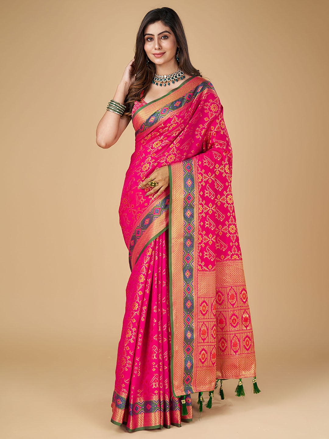 

Mitera Pink Ethnic Motifs Woven Design Zari Silk Patola Saree