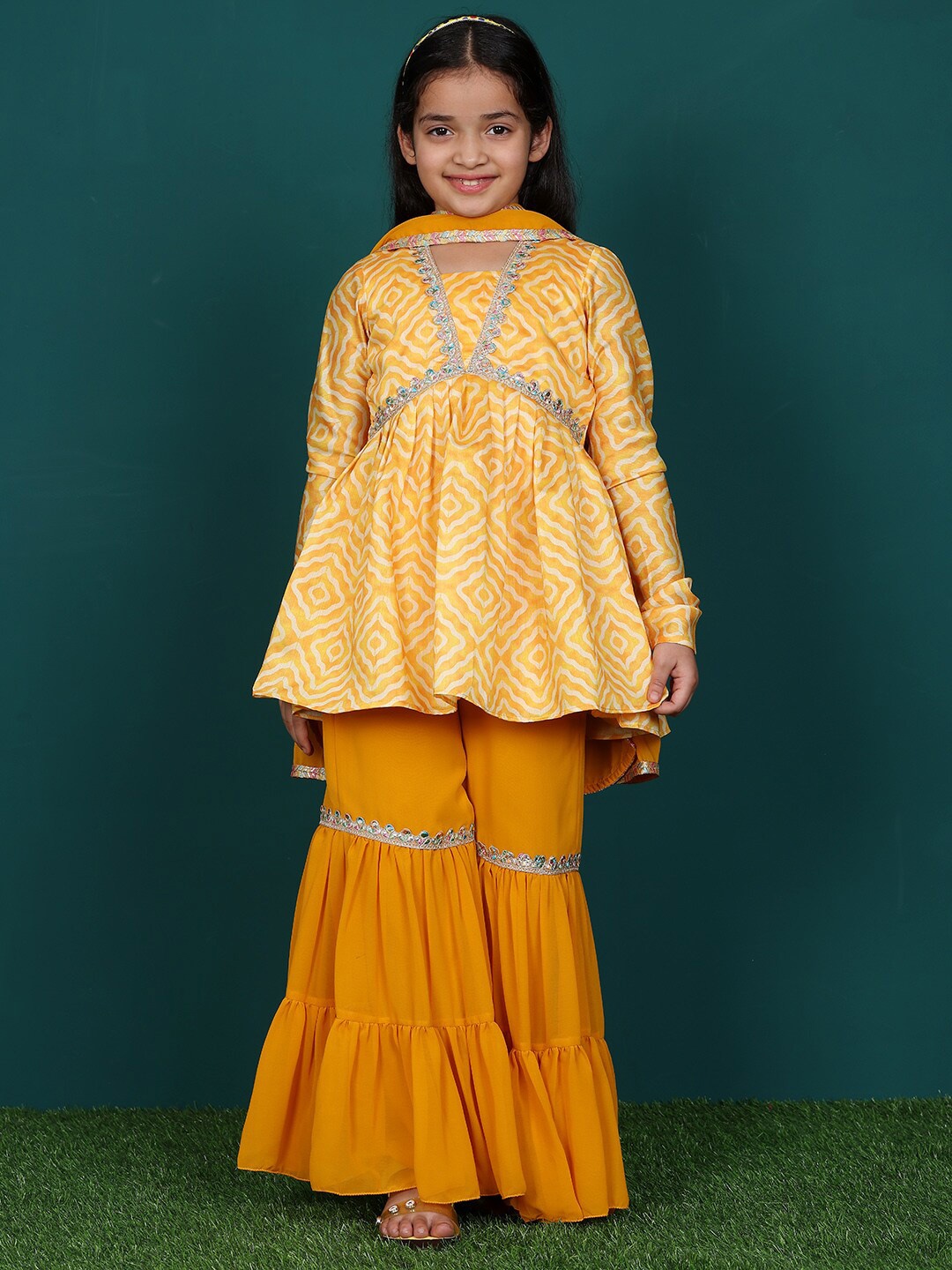 

Ethnovog Girls Square Neck Full Sleeves Gotta Patti A-line Kurta With Sharara & Dupatta, Yellow