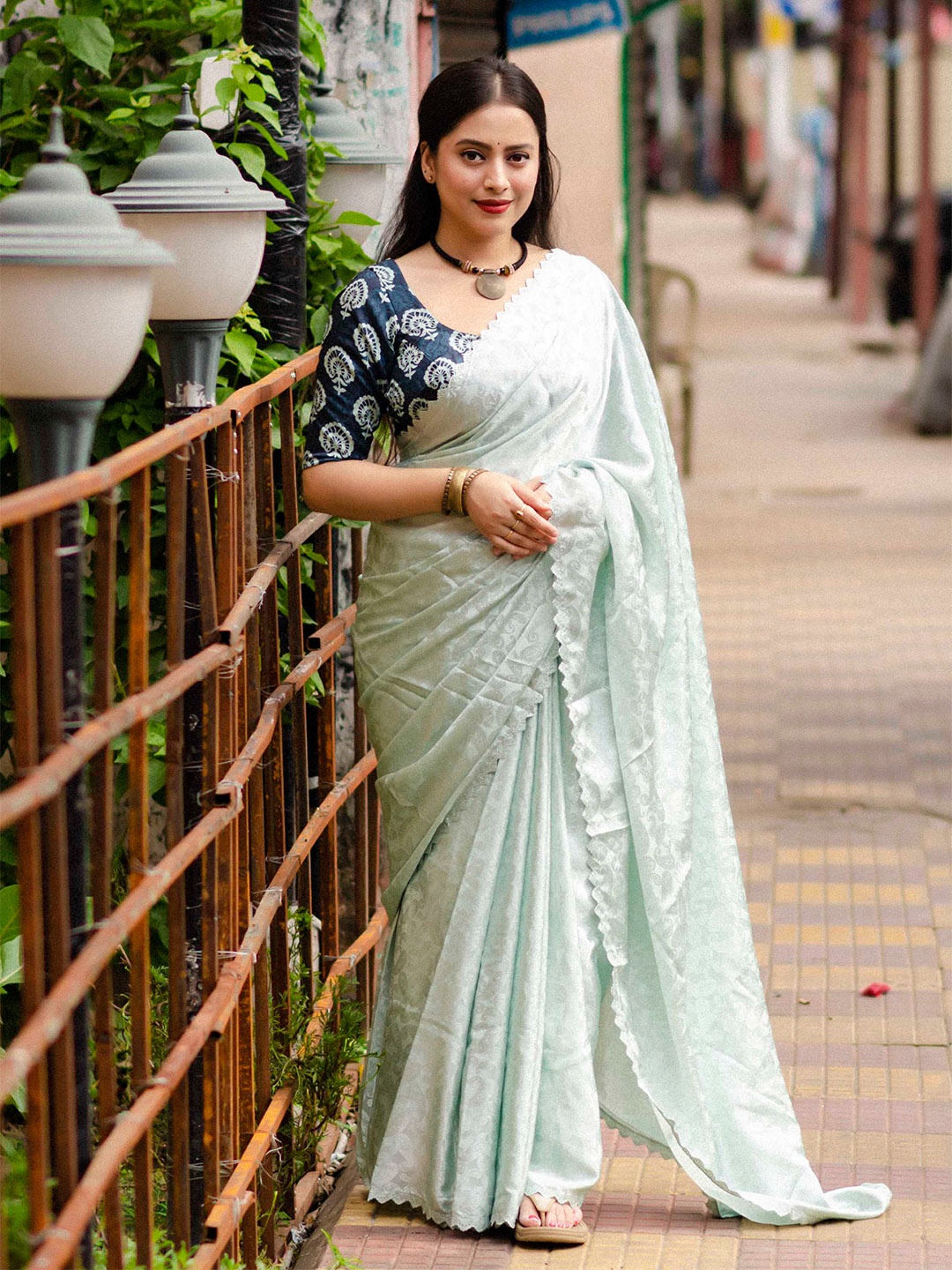 

Mitera Turquoise Blue Ethnic Motifs Woven Design Gotta Patti Saree