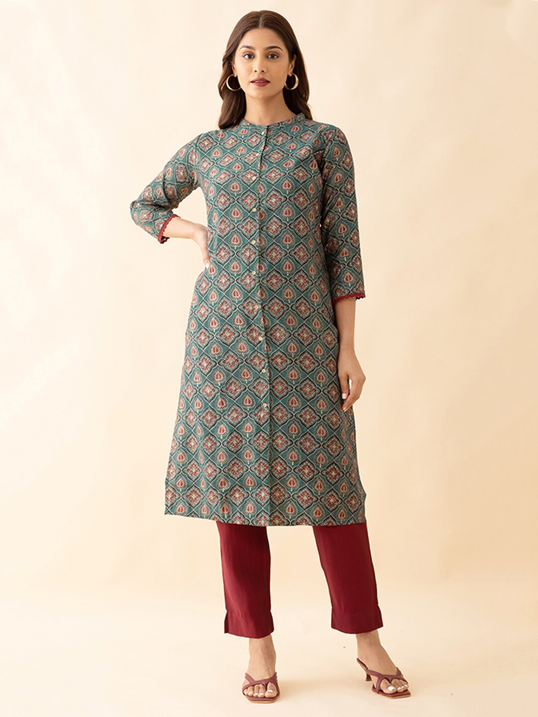 

Maybell Ethnic Motifs Printed Straight Kurta With Trouser, Green