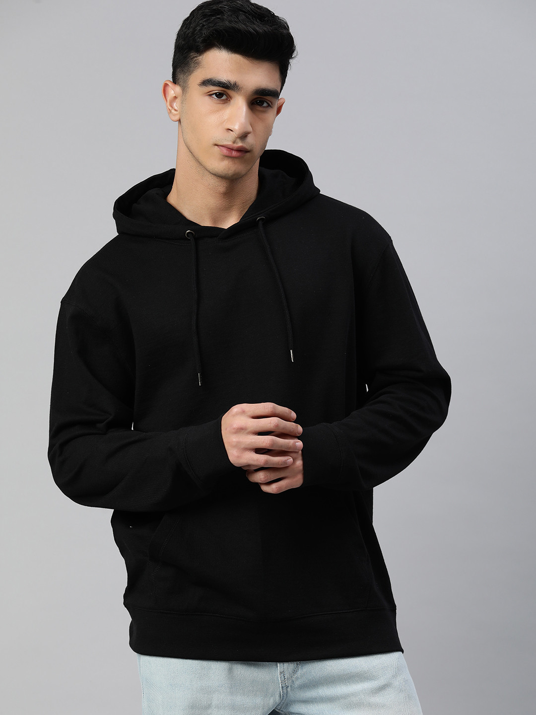 

Huetrap Men Solid Hooded Sweatshirt, Black