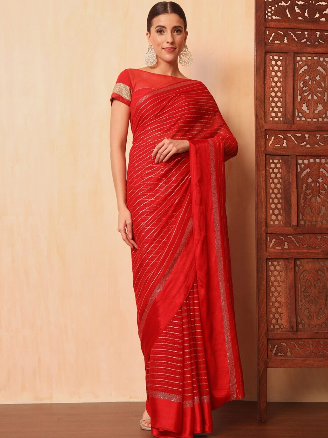 

Chhabra 555 Striped Zari Leheriya Saree, Red
