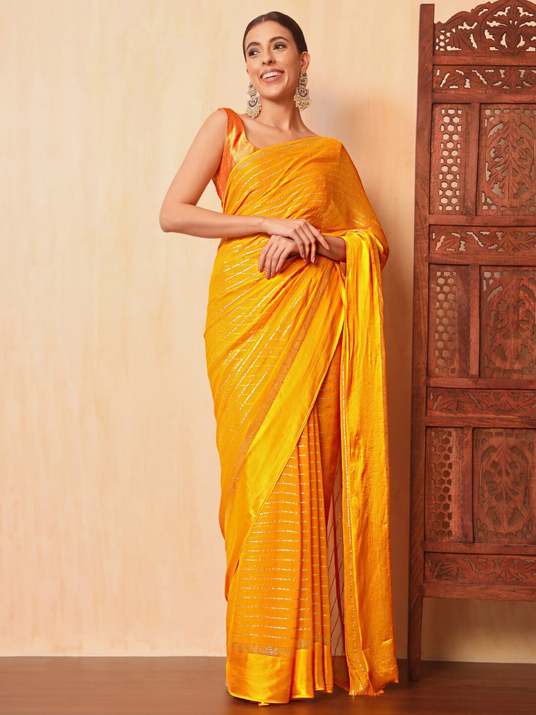 

Chhabra 555 Striped Embellished Zari Leheriya Saree, Yellow