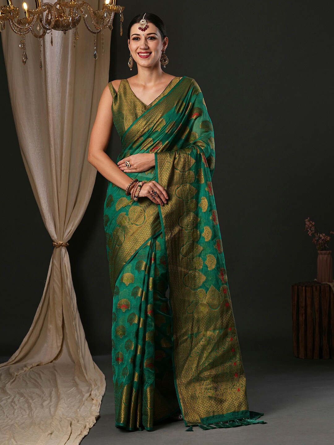 

Anouk Teal Ethnic Motifs Woven Design Zari Organza Banarasi Saree