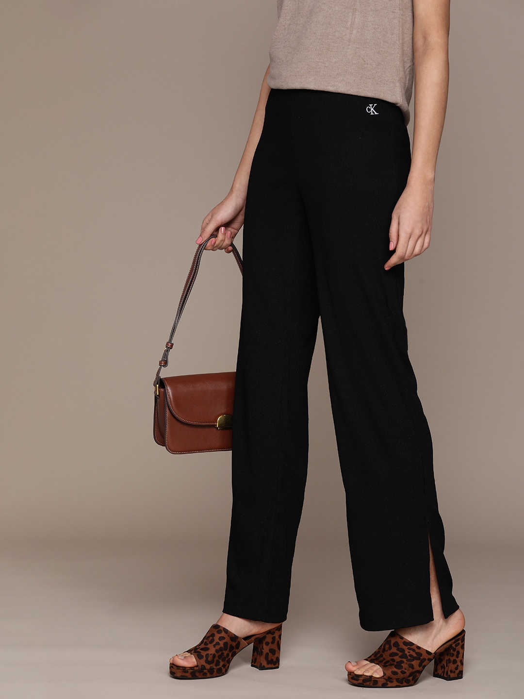 

Calvin Klein Jeans Women Straight Fit Easy Wash Knitted Trousers With Side Slits, Black