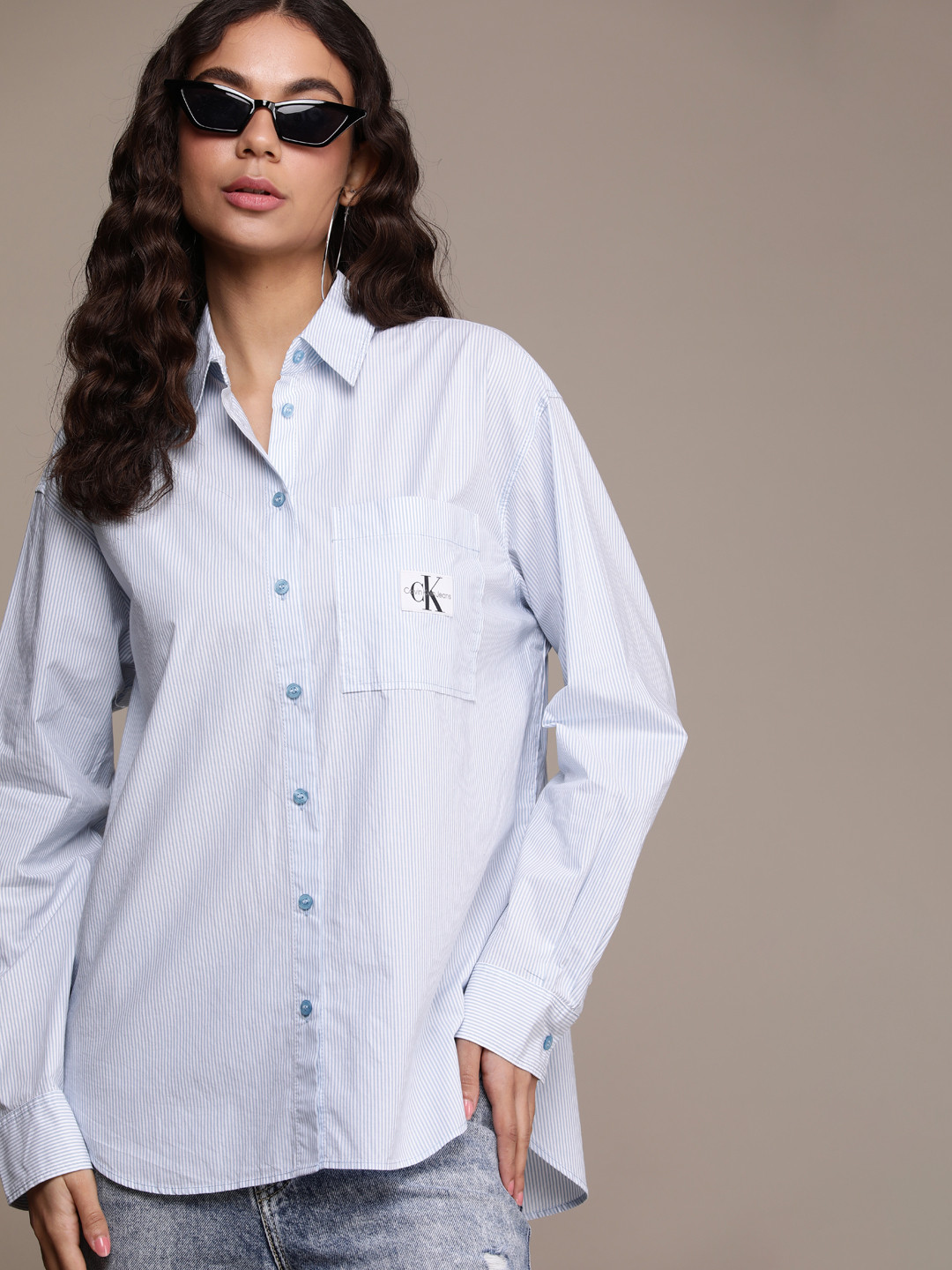 

Calvin Klein Jeans Women Pure Cotton Relaxed Fit Striped Casual Shirt, White