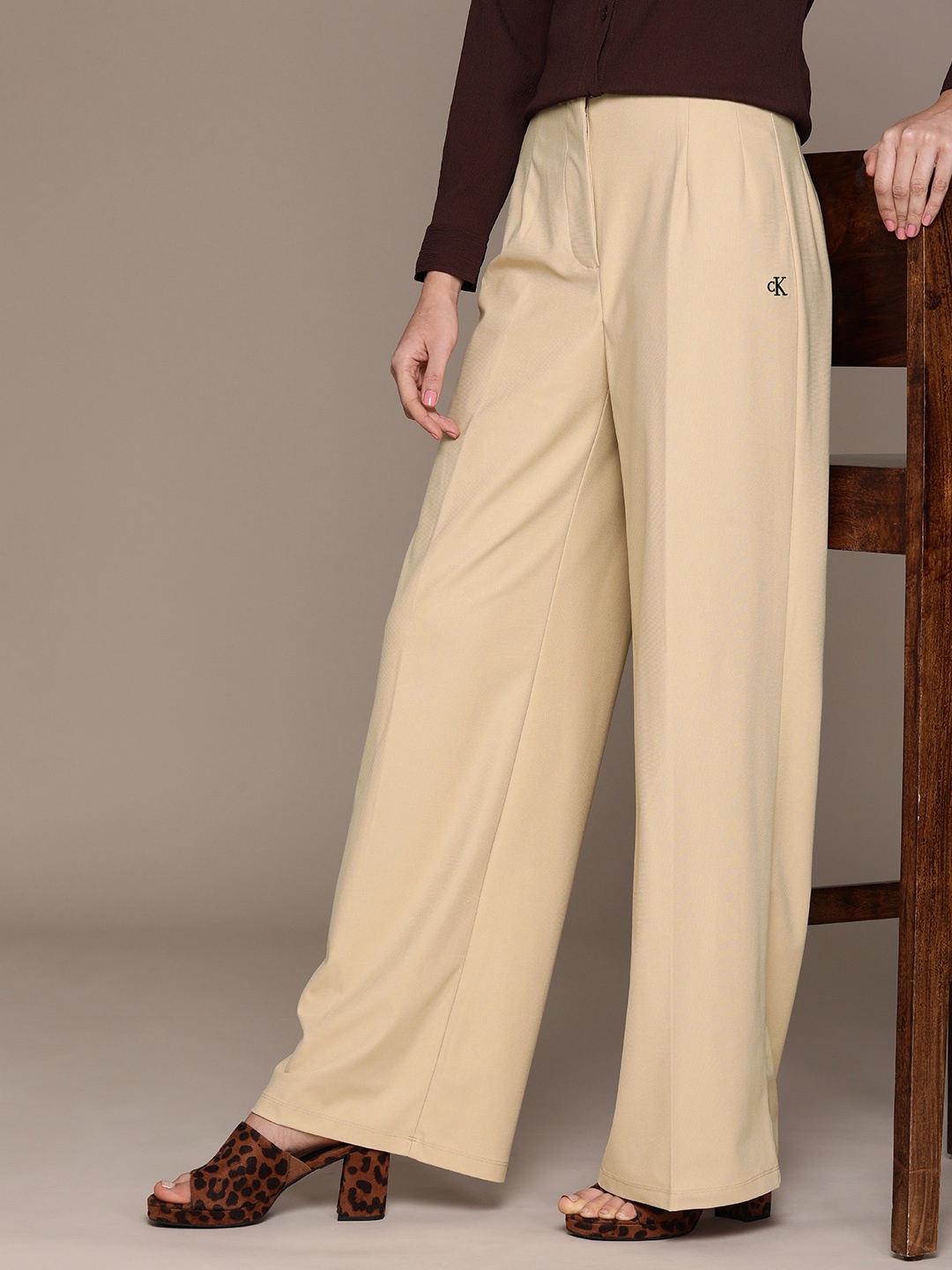 

Calvin Klein Jeans Women Loose Fit Easy Wash Wide Leg Trousers, Beige