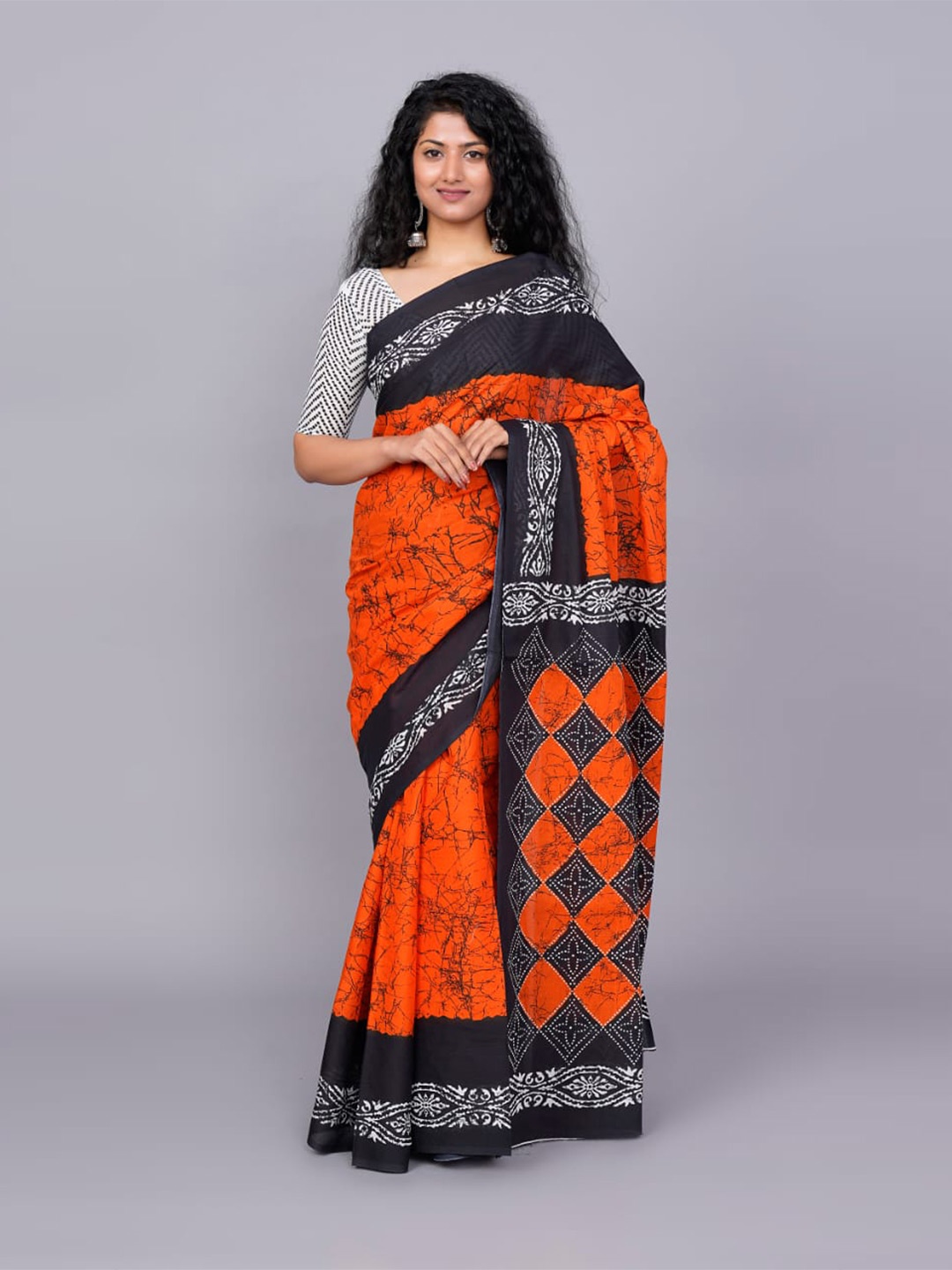 

TROPWEAR Abstract Printed Pure Cotton Ikat Saree, Orange