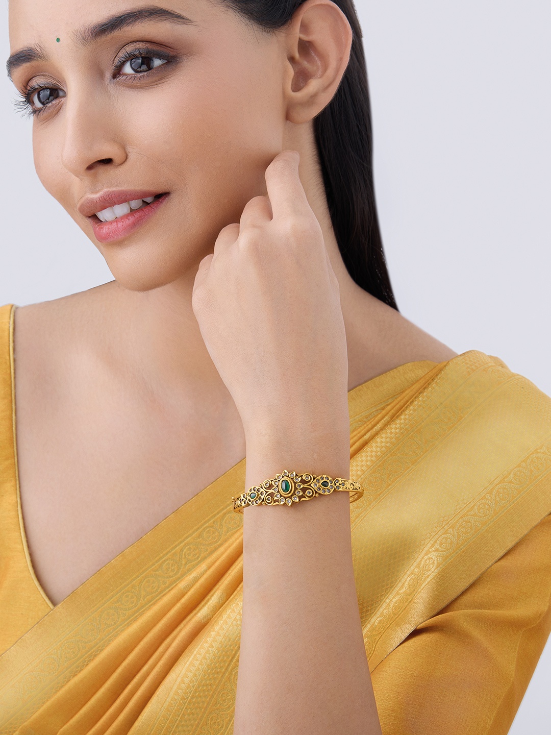 

Kushal's Fashion Jewellery Gold-Plated Stones Studded Kada Bracelet