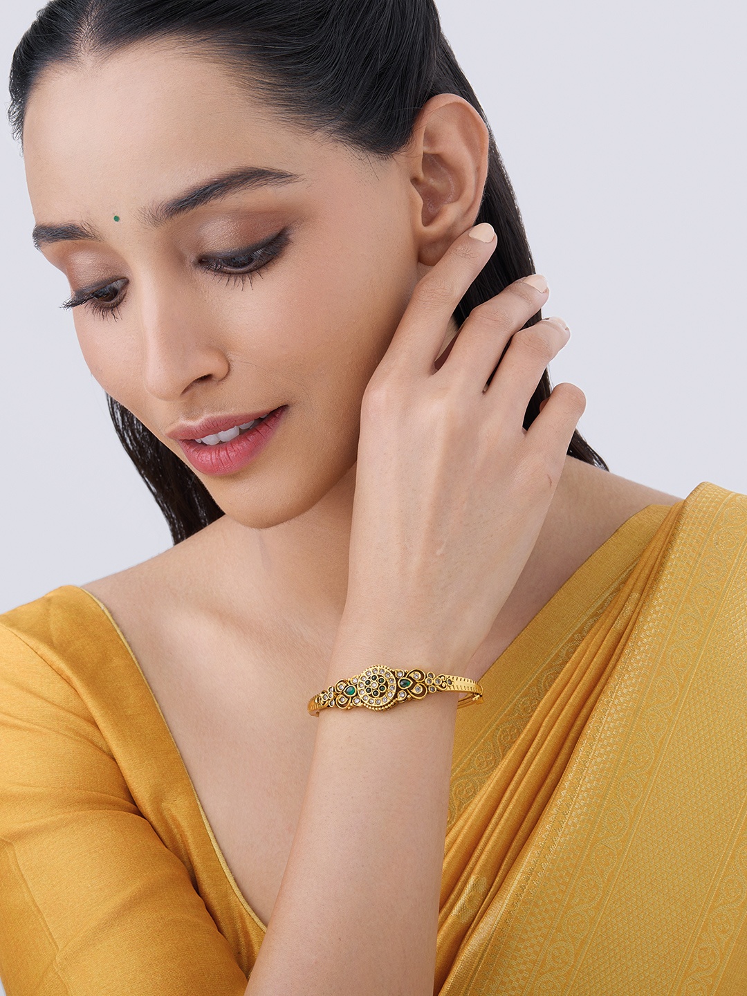 

Kushal's Fashion Jewellery Antique Gold-Plated Kada Bracelet