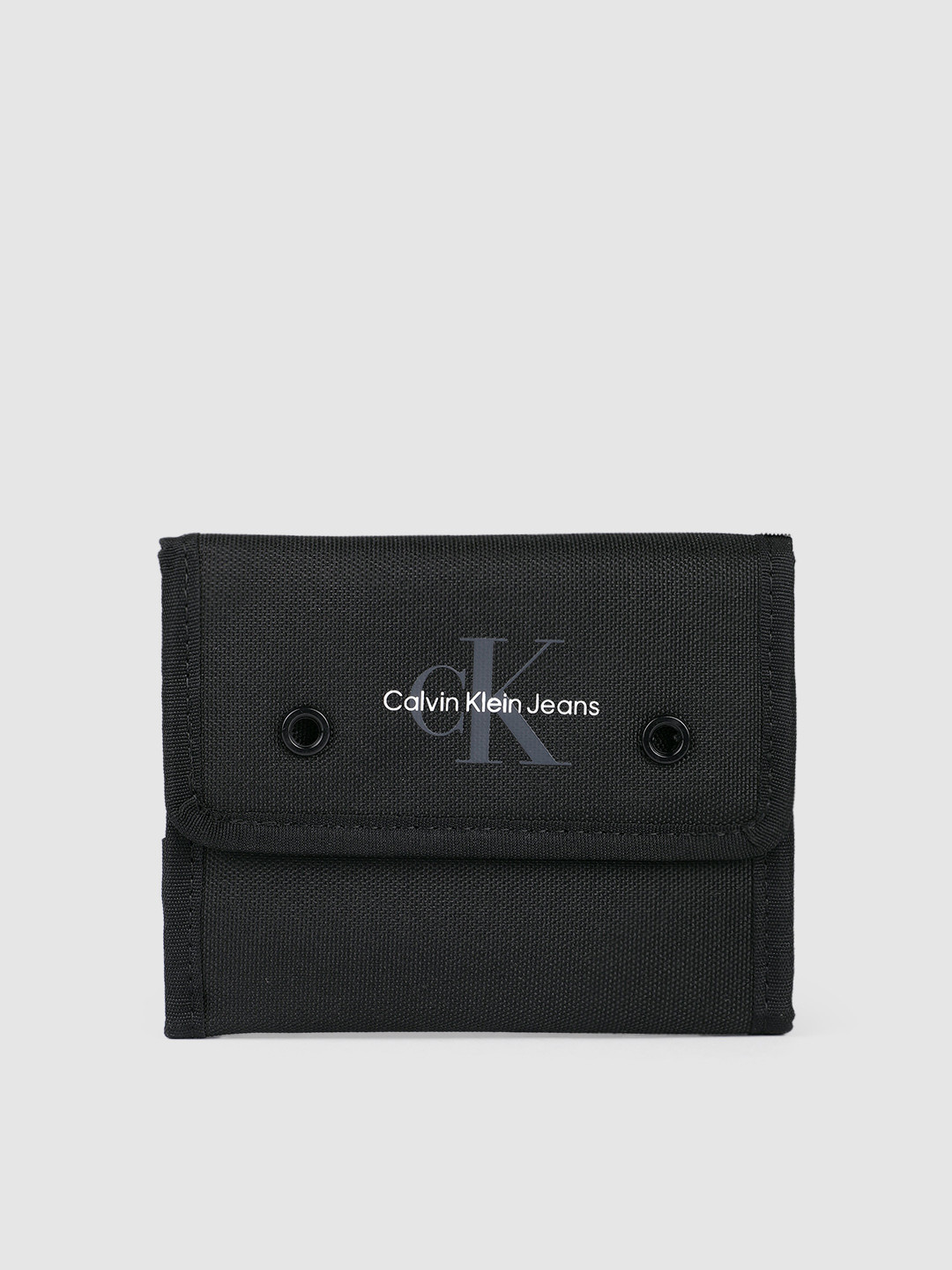 

Calvin Klein Men Brand Logo Print & Textured Three Fold Wallet, Black