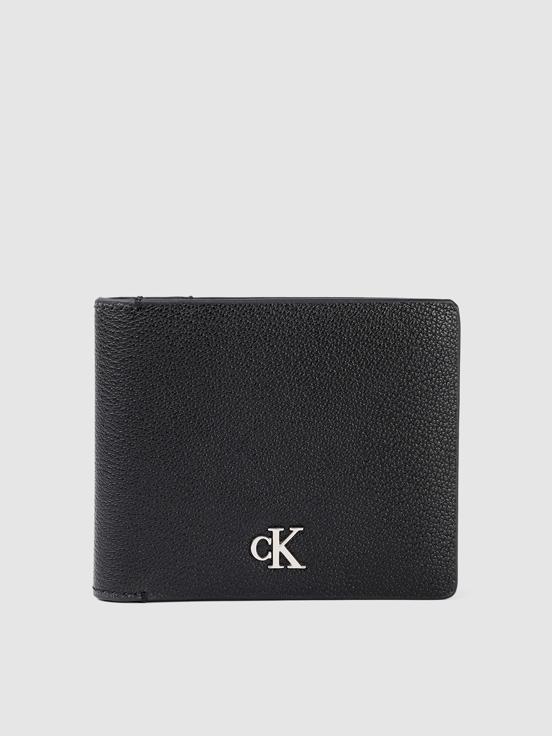 

Calvin Klein Men Abstract Textured Leather Two Fold Wallet With RFID Protection, Black
