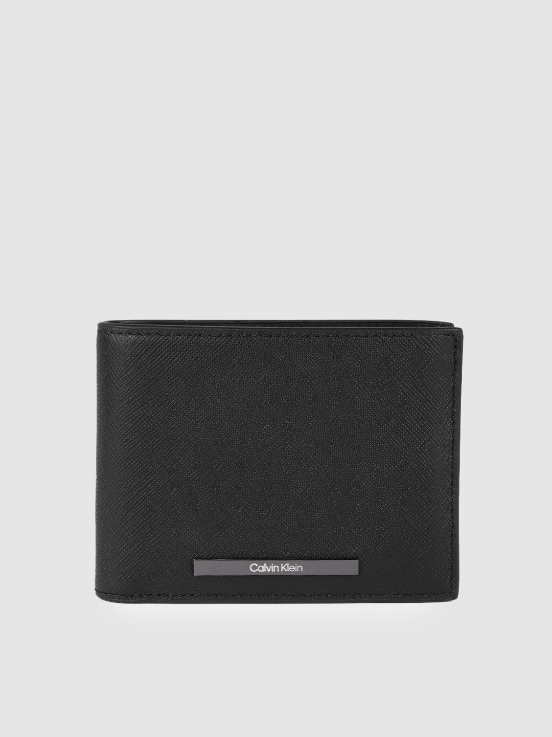 

Calvin Klein Men Abstract Textured Leather Two Fold Wallet With RFID Protection, Black