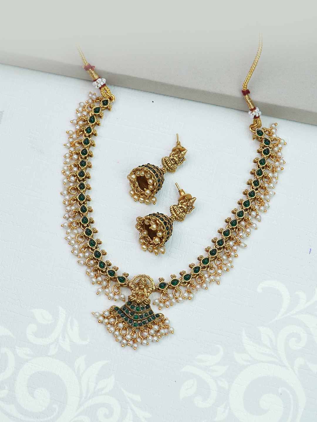 

Diksha collection Gold-Plated Stone Studded Jewellery Set