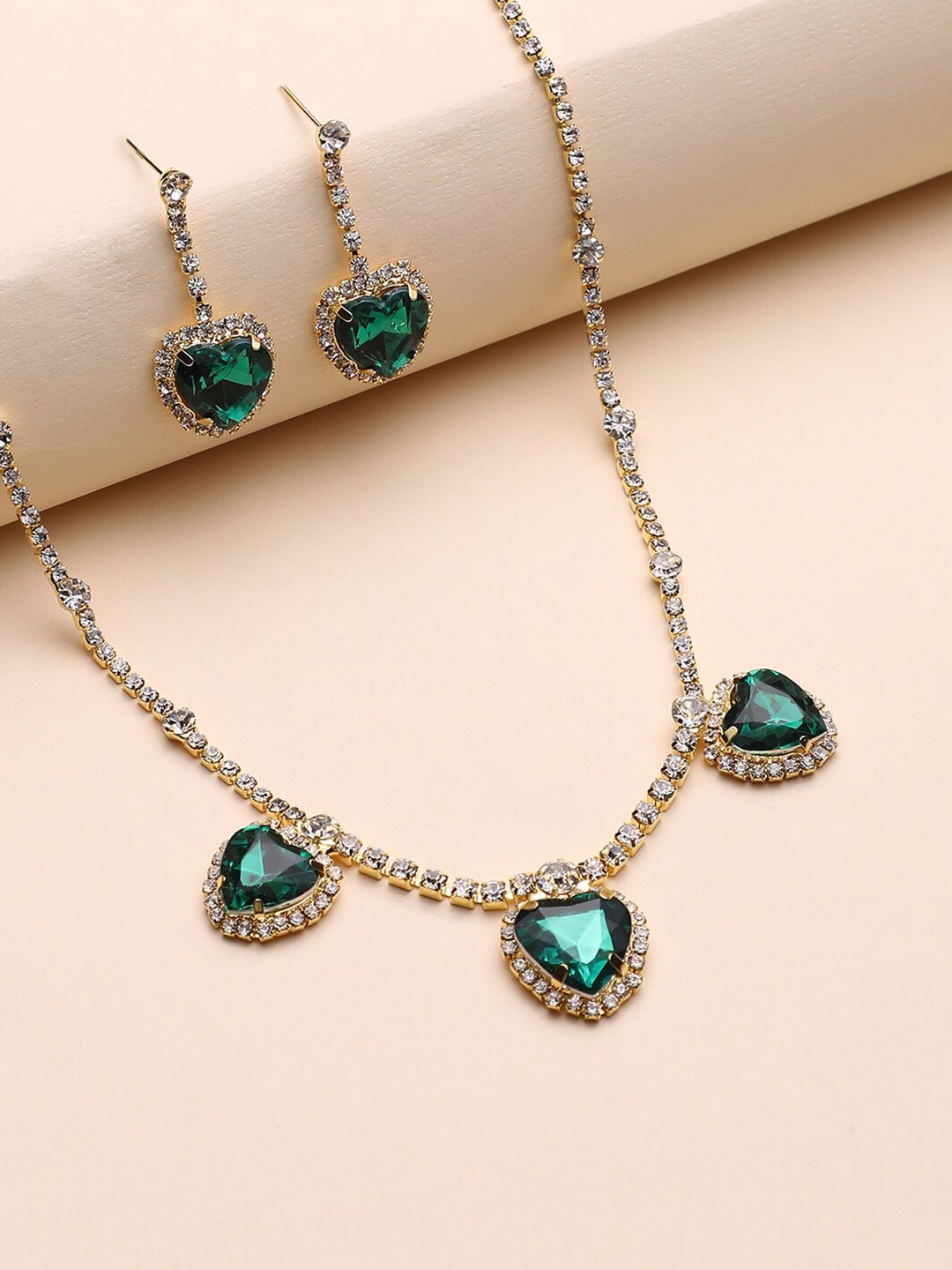 

DressBerry Gold-plated Green stone-studded Jewellery Set