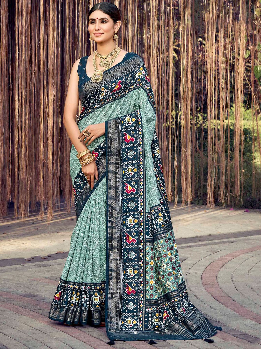 

Mitera Sea Ethnic Motifs Printed Woven Design Patola Saree, Sea green