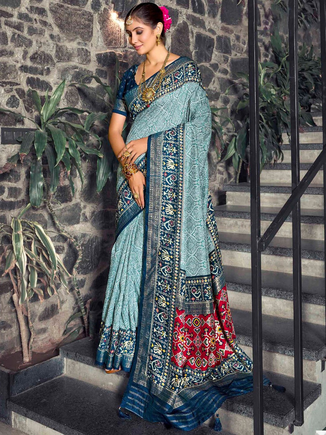 

Mitera Blue & Red Paisley Printed Zari Silk Patola Saree