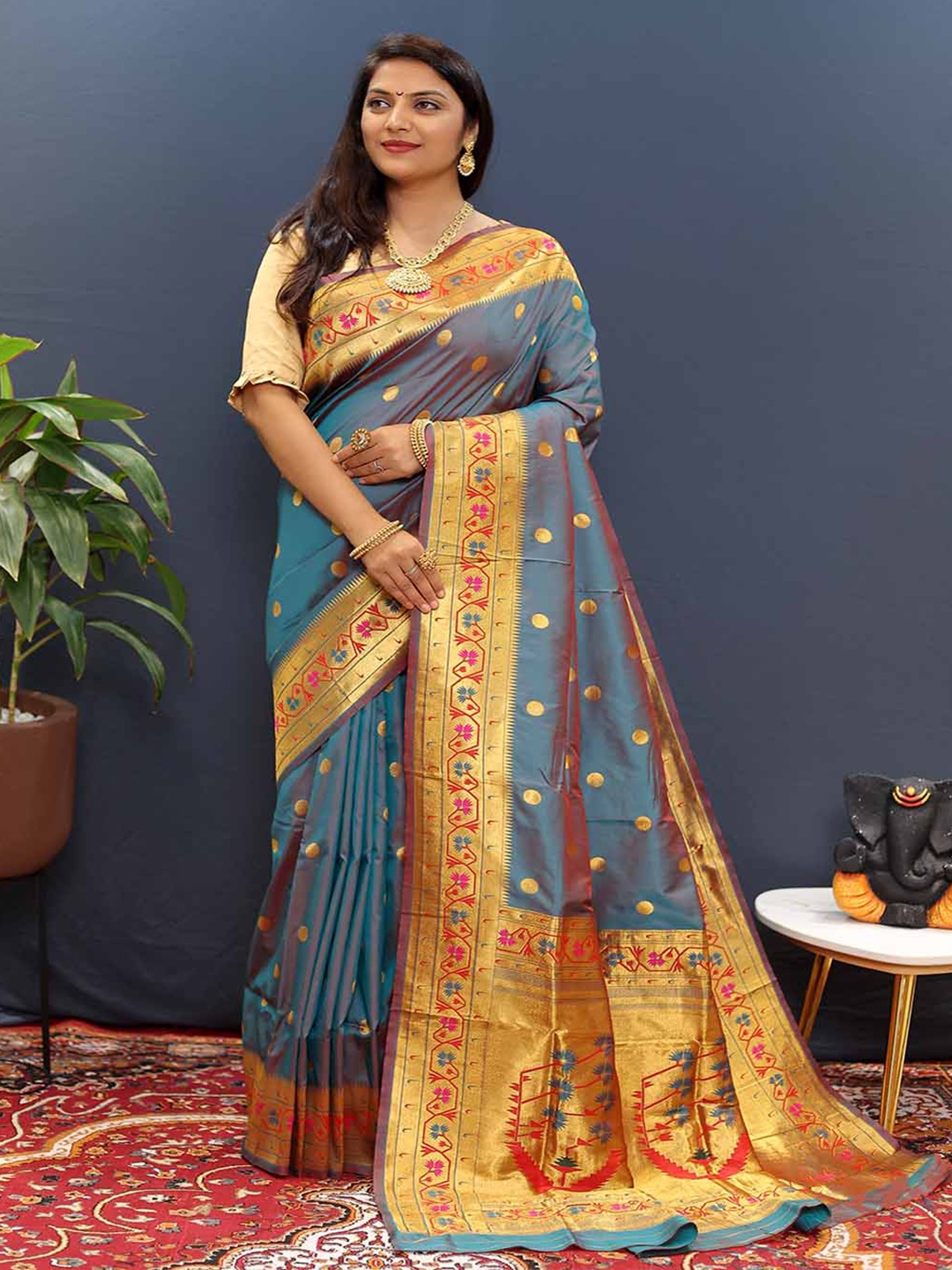 

Mitera Grey & Red Ethnic Motifs Woven Design Zari Art Silk Saree