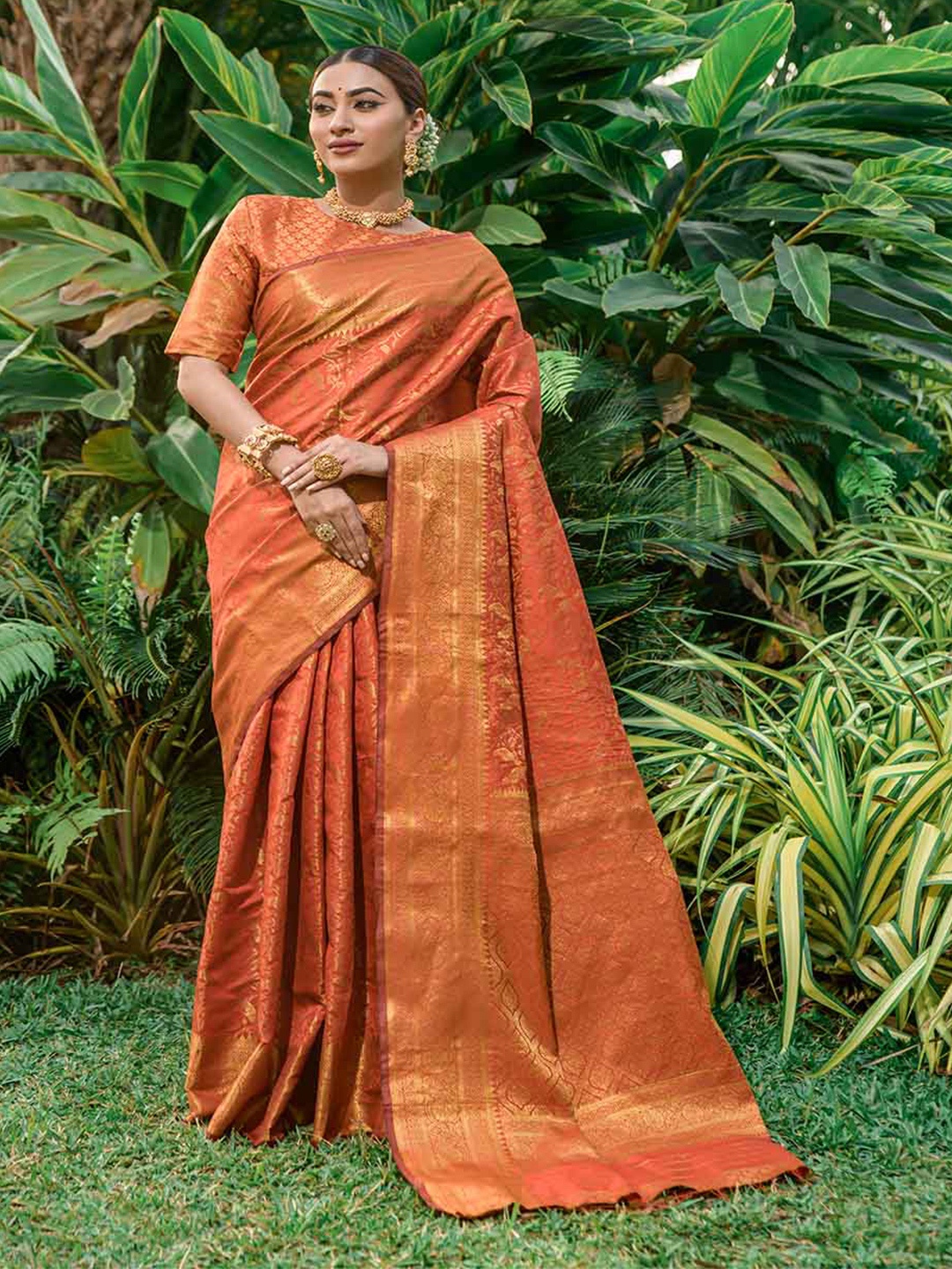 

Mitera Orange & Gold-Toned Ethnic Motifs Woven Design Zari Art Silk Saree