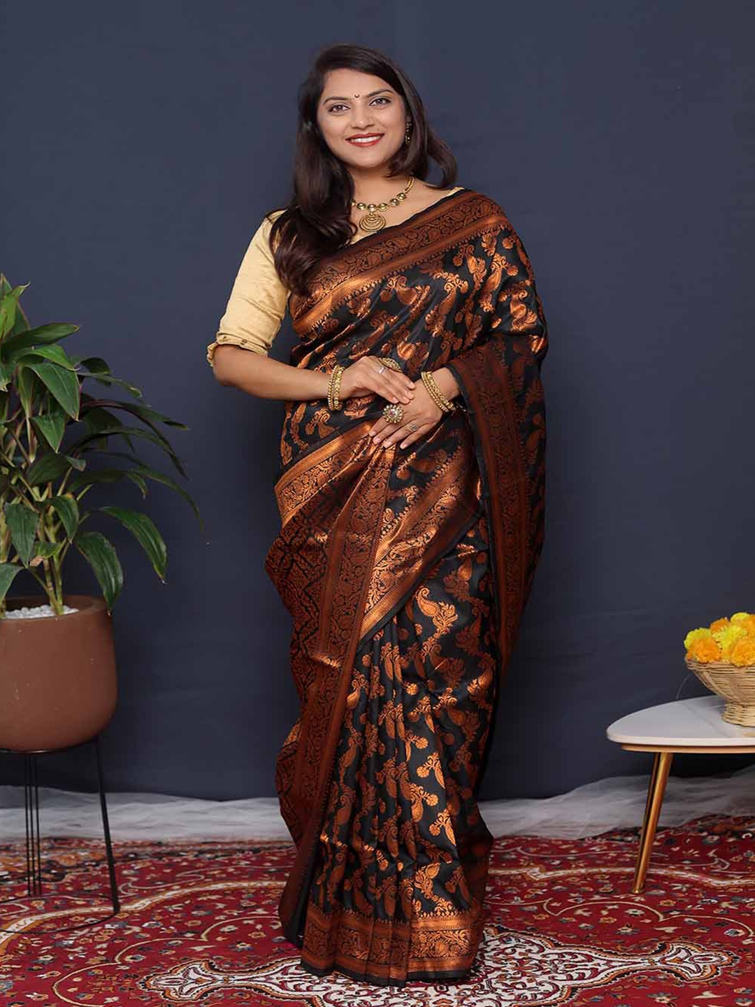 

Mitera Black & Copper-Toned Ethnic Motifs Woven Design Zari Art Silk Saree