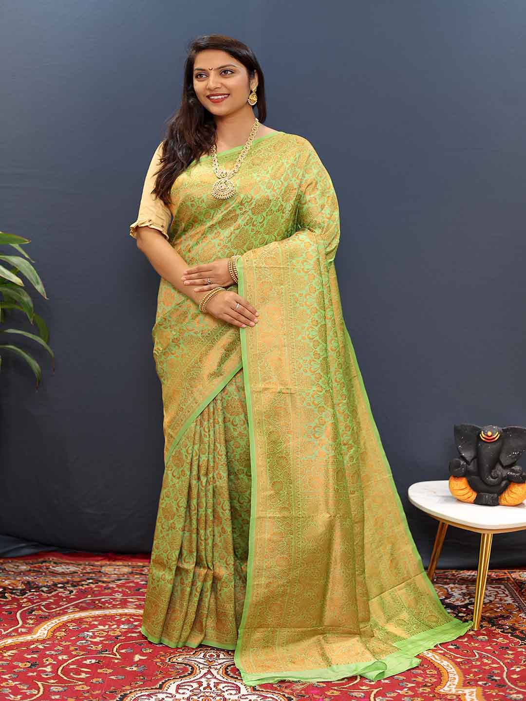 

Mitera Woven Design Zari Art Silk Saree, Green